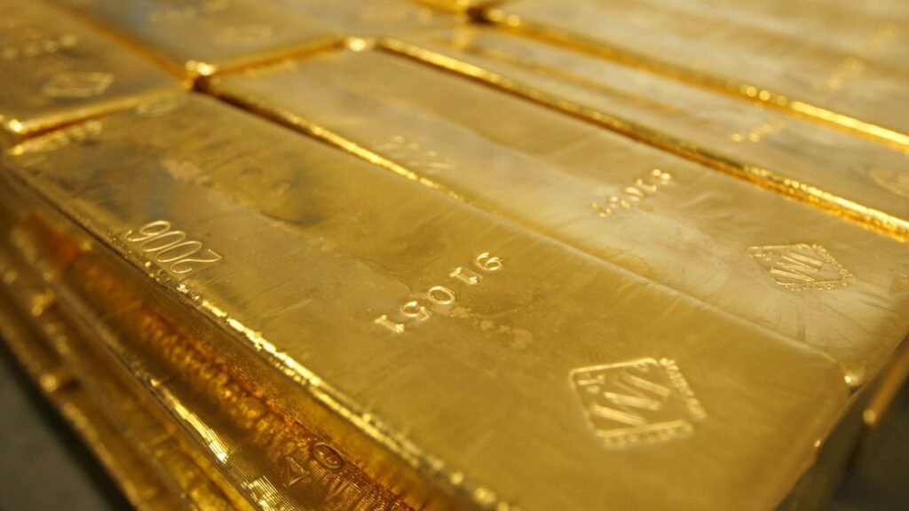 Federal official arrested after FBI finds $40M in gold bars at his home
