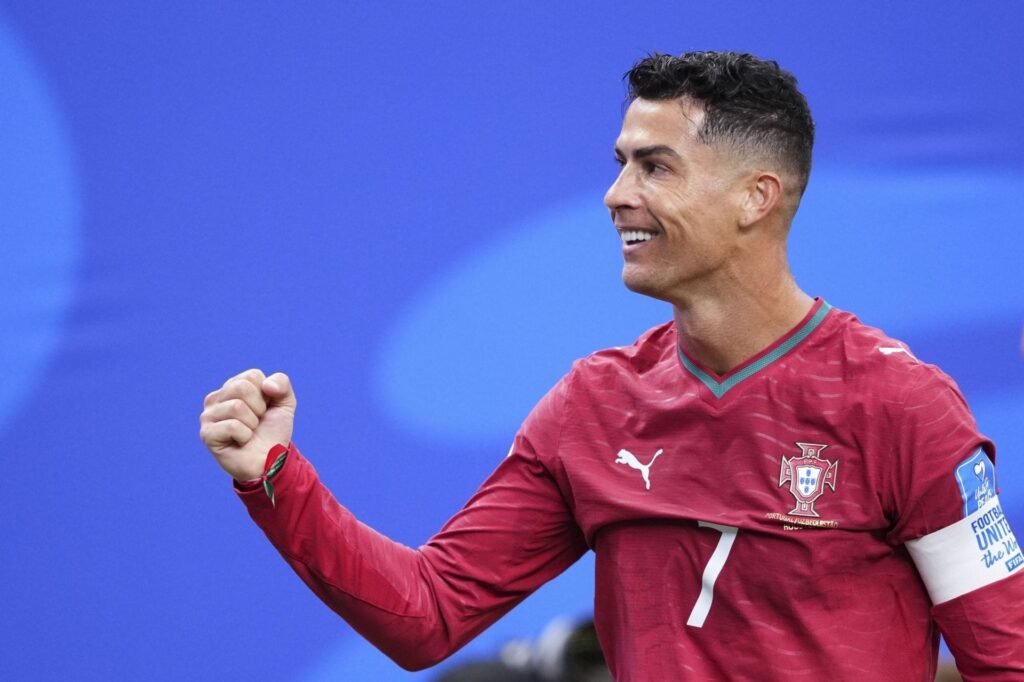 What records did Cristiano Ronaldo break after scoring brace for Portugal at the FIFA World Cup against Uzbekistan?