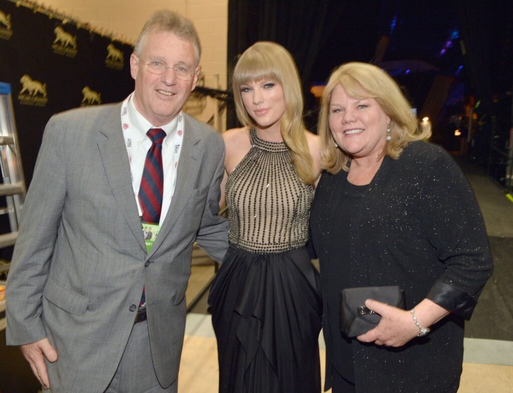 Who are Taylor Swift’s parents? Singer fights back tears thanking family after becoming youngest Songwriters Hall of Fame inductee