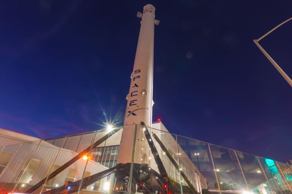 SpaceX succumbs to gravity as the stock briefly dips below its debut price on Nasdaq