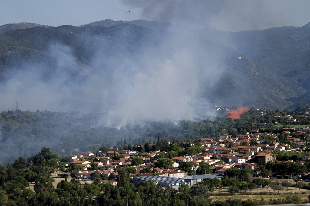 Record Heat Drives Wildfires in Europe, Forces Thousands to Evacuate