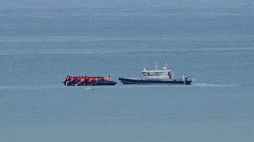 Record 230 migrants cross English Channel in single small boat, French officials say