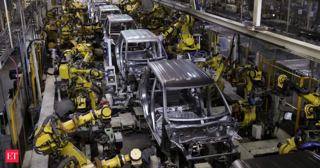 Carmakers partly absorb commodity shocks to keep production on track